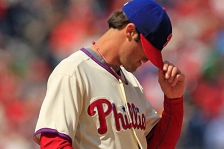 Cole Hamels was suspended five games for intentionally throwing at Bryce Harper Sunday. (Ron Cortes/Staff Photographer)