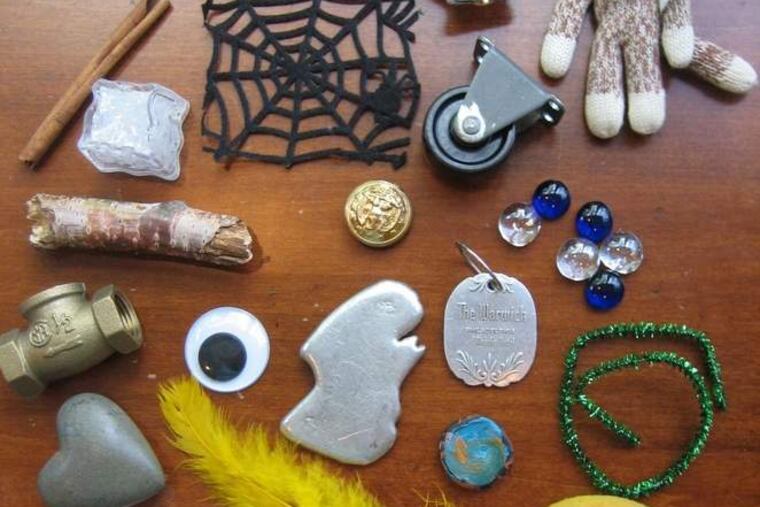 Artifacts that Elizabeth Mosier brings to show students, who write essays to explain how an archaeologist might explain them.