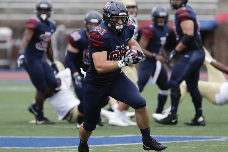 Penn tight end Logan Sharp runs with the football in the second quarter against Lehigh on Saturday.