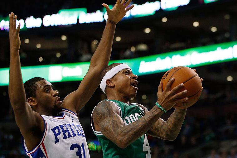 Boston Celtics' Isaiah Thomas (4) drives past Philadelphia 76ers' Hollis Thompson (31) during the second quarter of an NBA basketball game in Boston, Wednesday, Oct. 28, 2015.