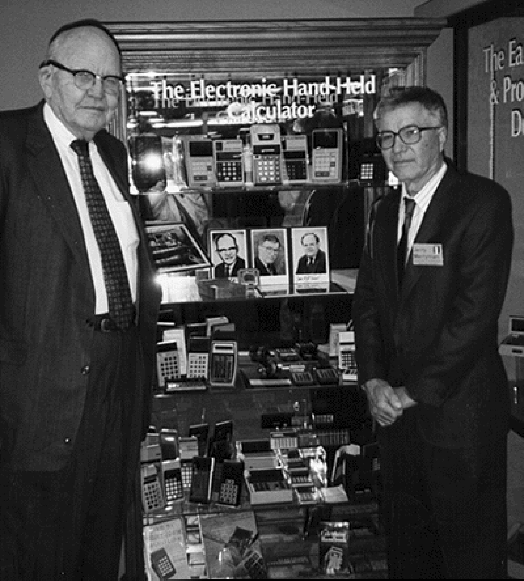 This 1997 photo taken by Phyllis Merryman shows Jack Kilby and Jerry Merryman (right) at the American Computer Museum in Bozeman, Mont. Kilby, Merryman and James Van Tassel are credited with having invented the handheld calculator while working at Dallas-based Texas Instruments. Merryman died Feb. 27, 2019, at the age of 68. (Phyllis Merryman via AP)