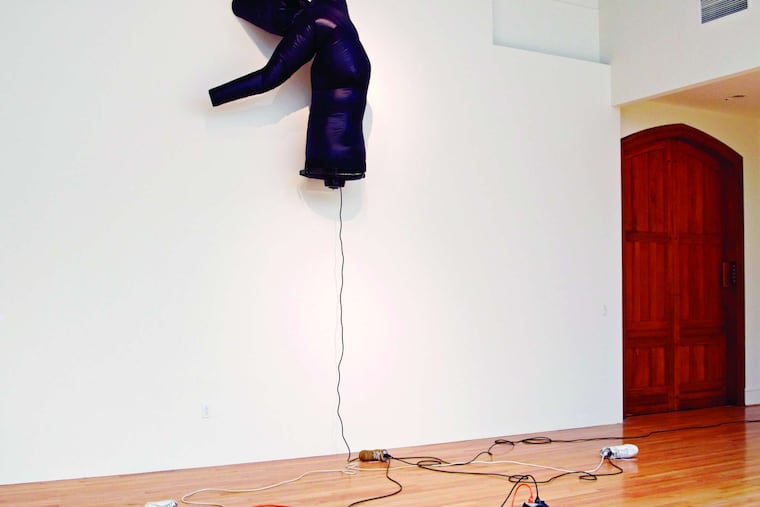 "Pillowsophia," by Paul Chan, a fluttering, inflatable figure seemingly choreographed by plugged-in footwear, at PAFA's Morris Gallery.