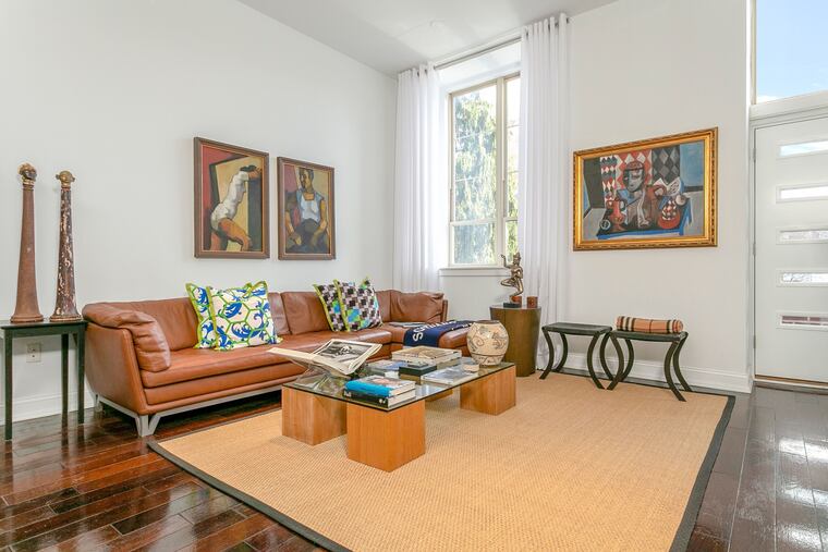 The living room of Unit 10 in the condo building at 200 Christian St. in Philadelphia's Queen Village section. The condo is on the market for $575,000.
