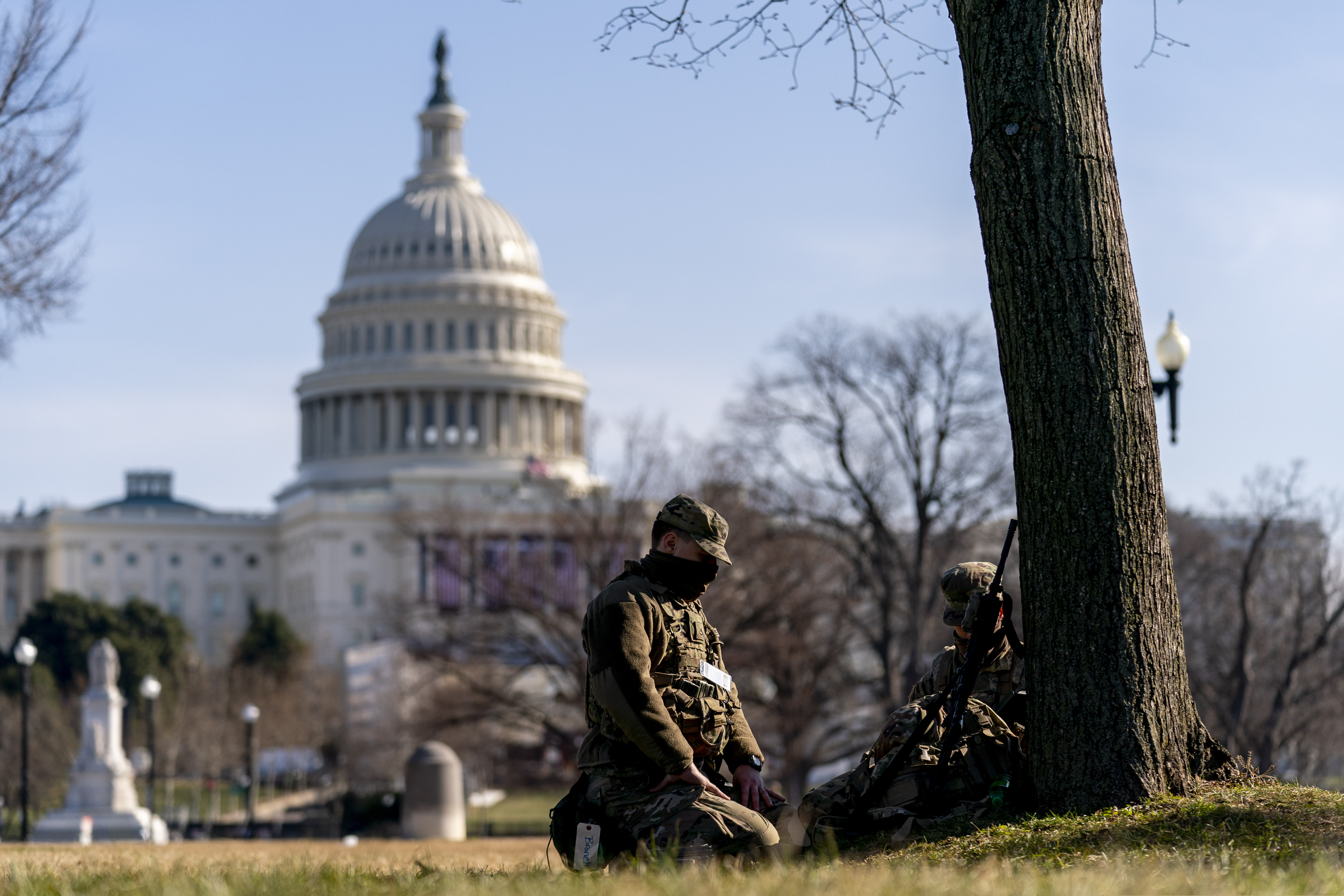 Members of the National Guard work outside the U.S Capitol building on Capitol Hill in Washington.