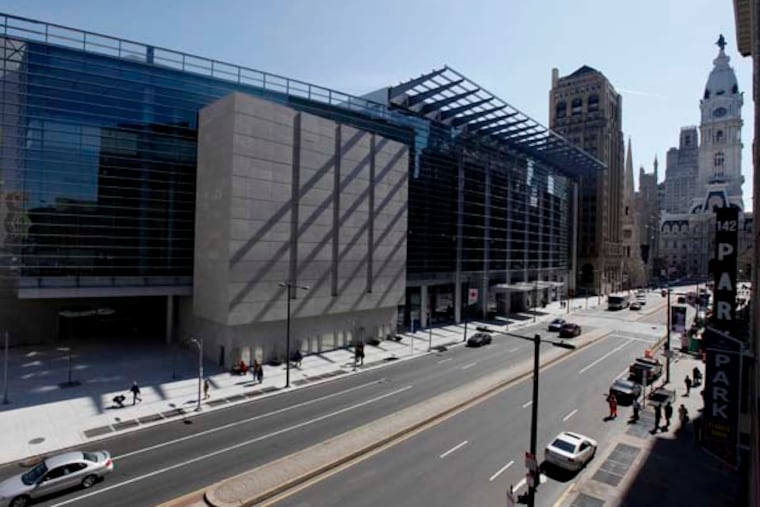 The newly expanded Pennsylvania Convention Center is seen in view of City Hall in Philadelphia, Friday, March 4, 2011. (AP Photo/Matt Rourke)