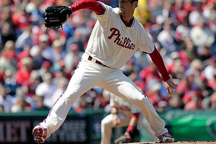 What do you make of Cole Hamels now that the Phillies' ace has crapped out in his first two starts? (H. Rumph Jr/AP)