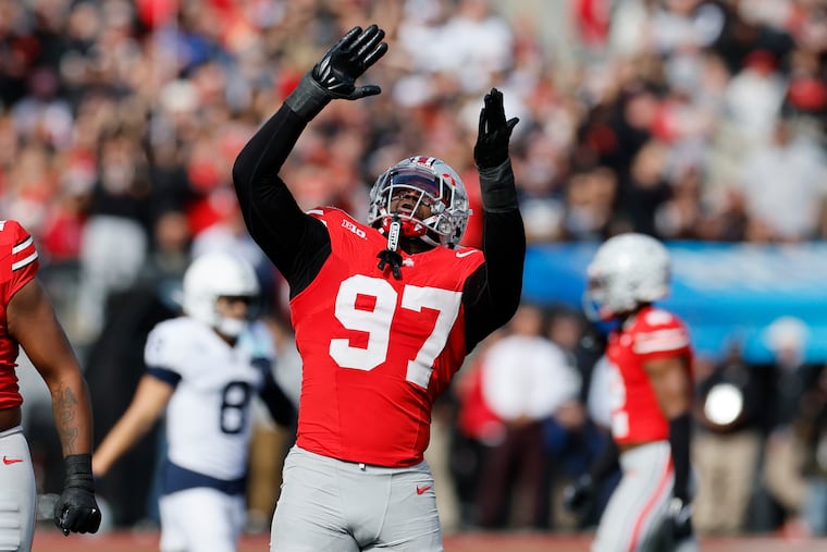 Ohio State defensive lineman Kenyatta Jackson celebrates a sack against Penn State on Nov. 1.