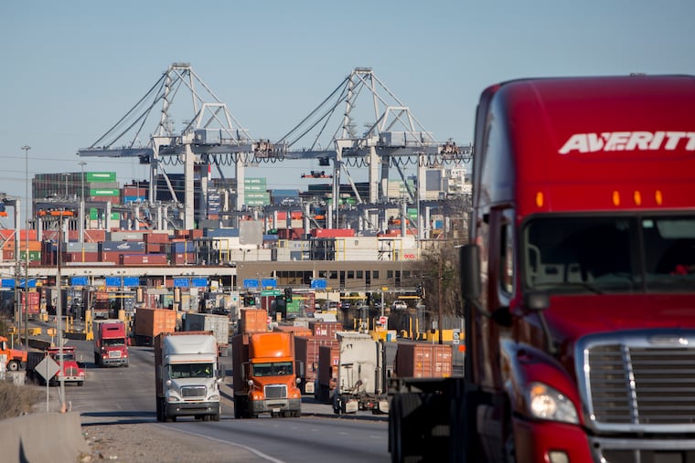 Tractor-trailers move cargo out of the Port of Savannah in Savannah, Ga. Job growth has been strong, but wage growth has been below expectations.