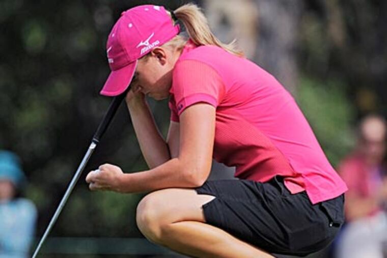 Stacy Lewis lines up a putt on the 10th hole on Friday. (Chris Carlson/AP)
