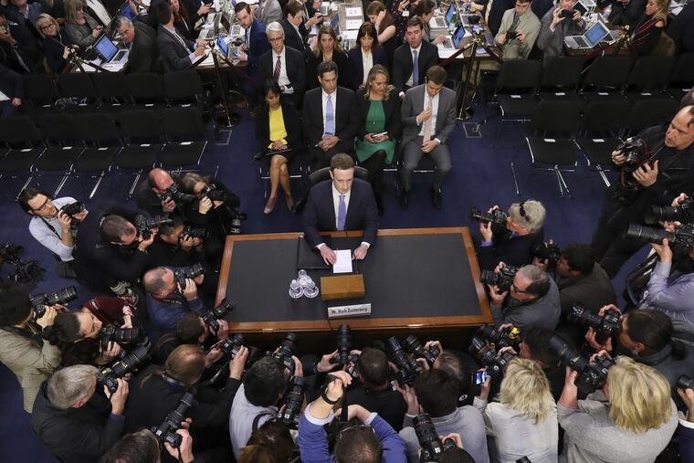 Facebook CEO Mark Zuckerberg arrives to testify before a joint hearing of the Commerce and Judiciary Committees on Capitol Hill.