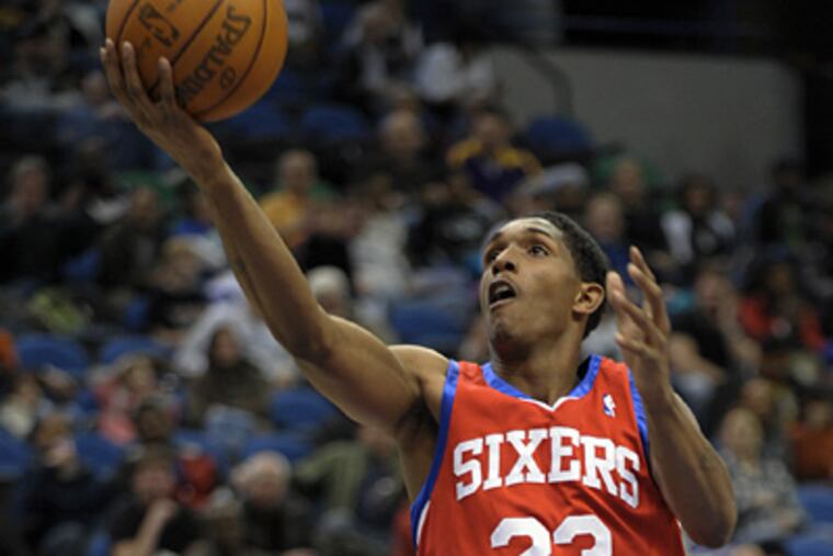 Lou Williams goes to the basket during the first quarter of the Sixers' loss to the Timberwolves. (AP Photo/Tom Olmscheid)