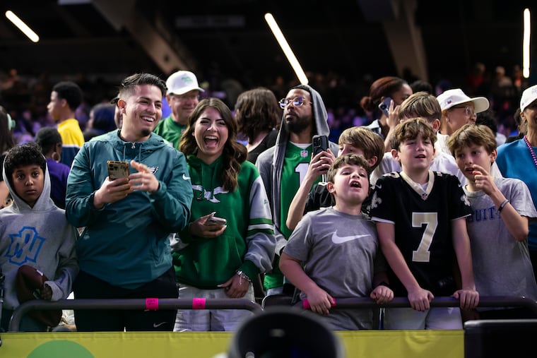 Philadelphia Eagles fans cheer during Super Bowl LIX Opening Night at the Caesars Superdome in New Orleans. The Philadelphia Eagles will take on the Kansas City Chiefs on Sunday.