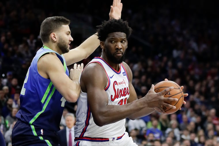 Sixers center Joel Embiid looking to drive against Mavericks forward Maxi Kleber last month.