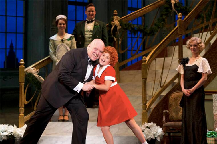 “Annie” stars Issie Swickle in the title role and Gilgamesh Taggett as Daddy Warbucks. (JOAN MARCUS)