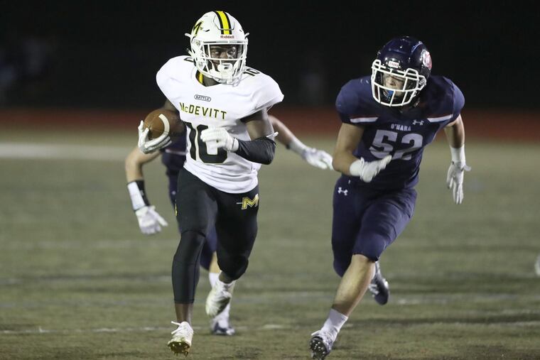 Bishop McDevitt's Jon-Luke Peaker (10) runs for yardage in a 12-7 win over Cardinal O'Hara on Sept. 14.