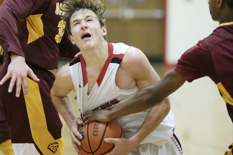 Junior guard Mike DePersia drives to the basket for Haddonfield against Haddon Heights.
