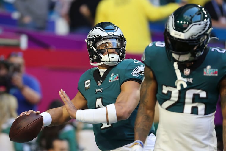 Philadelphia Eagles quarterback Jalen Hurts warms up pregame at Super Bowl LVII against the Kansas City Chiefs at State Farm Stadium on Sunday, Feb. 12, 2023, in Glendale, AZ.