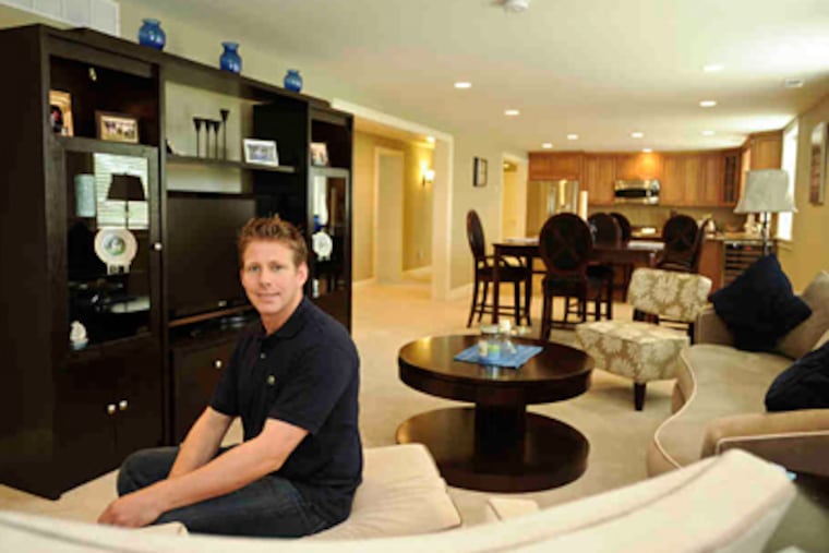Terry Visconto in his second-floor apartment, converted from a vacant convent at Resurrection of Our Lord Parish in Northeast Philadelphia. (Ron Tarver / Staff Photographer)