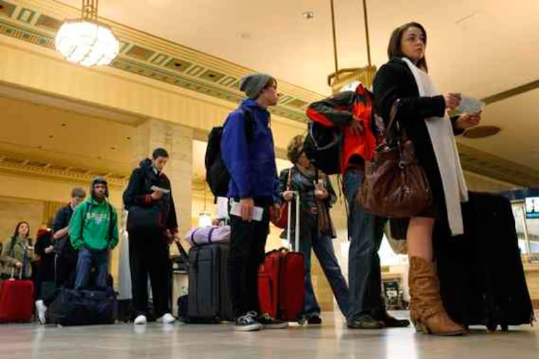 Travelers waiting in line at the 30th Street Station in Philadelphia on Wednesday. Amtrak said bookings across its system were comparable to, and maybe better than, a year ago.