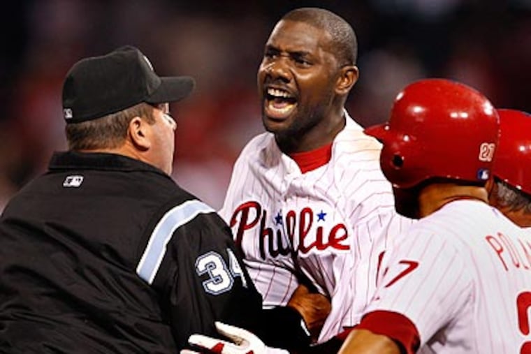 Ryan Howard gave the umpires an earful after being ejected in the 14th inning. (Ron Cortes/Staff Photographer)