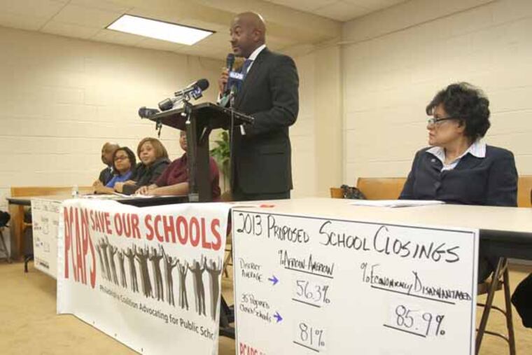 ACTION United, the Philadelphia Coalition advocating for Public Schools, and local clergy and politicians say they have proof the Philadelphia School District is discriminating against black, Hispanic, poor and disabled kids with its planned closures of 37 schools. Rev. Kevin Johnson, center, of Bright Hope Baptist Church speaks at the press conference as City Councilwoman Jannie Blackwell looks on right. ( Charles Fox / Staff Photographer )
