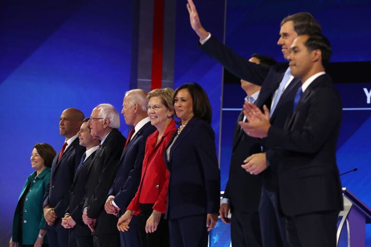 Democratic presidential candidates Sen. Amy Klobuchar (D-MN) (L-R), Sen. Cory Booker (D-NJ), South Bend, Indiana Mayor Pete Buttigieg, Sen. Bernie Sanders (I-VT), former Vice President Joe Biden, Sen. Elizabeth Warren (D-MA), Sen. Kamala Harris (D-CA), former tech executive Andrew Yang, former Texas congressman Beto O’Rourke, and former housing secretary Julian Castro (Justin Sullivan/Getty Images/TNS)