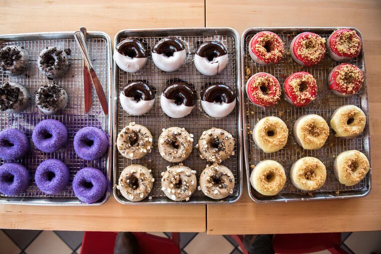 Federal Donuts' flavor maker gives families a lesson in doughnut-making on Saturday afternoon.