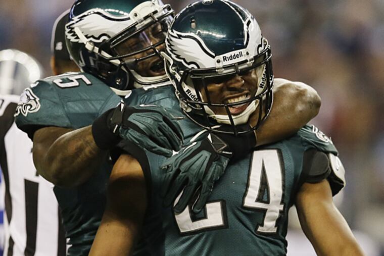 After recovering a fumble by Dallas Cowboys running back DeMarco Murray, Philadelphia Eagles cornerback Bradley Fletcher (24) celebrates with defensive end Vinny Curry during the first half of an NFL football game, Sunday, Dec. 29, 2013, in Arlington, Texas. (Tony Gutierrez/AP)