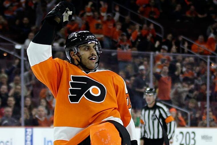 Philadelphia Flyers' Pierre-Edouard Bellemare celebrates after his goal during the second period of an NHL hockey game against the Florida Panthers, Thursday, Nov. 6, 2014, in Philadelphia. (Matt Slocum/AP)