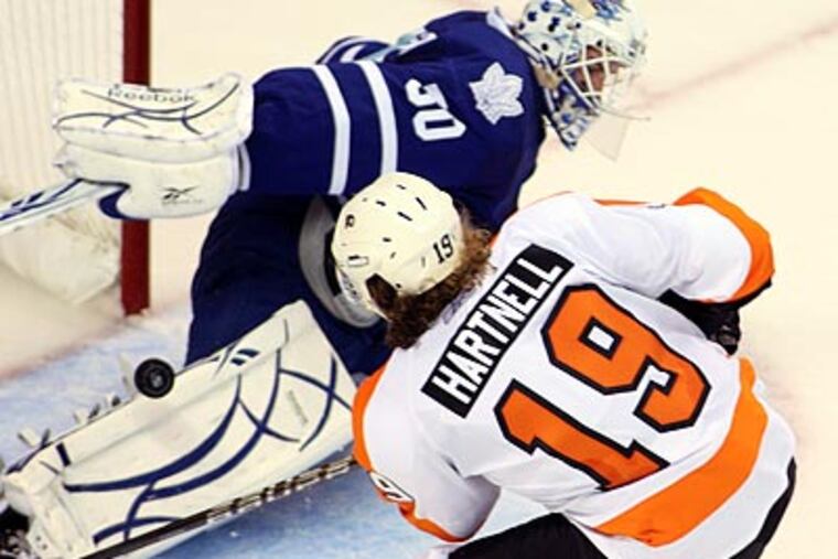 Scott Hartnell is stopped by Toronto goalie Jonas Gustavsson. (AP Photo/The Canadian Press, Dave Chidley)