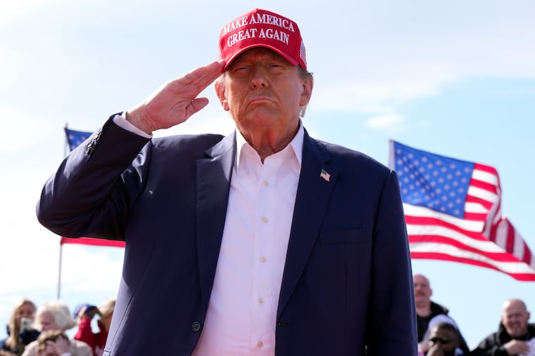 Republican presidential candidate former President Donald Trump salutes at a campaign rally last week in Vandalia, Ohio.