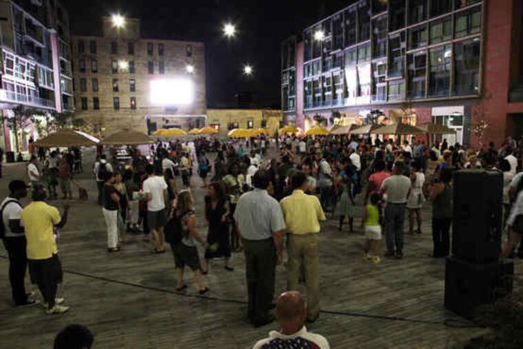 People hang out, eat, shop, and dance at The Piazza at Schmidts. "It seemed like it was an isolated incident," one visitor said.