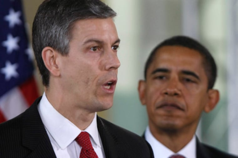President-elect Barack Obama listens to his education secretary-designate, Arne Duncan. "When it comes to school reform, Arne is the most hands-on of hands-on practitioners," Obama said.