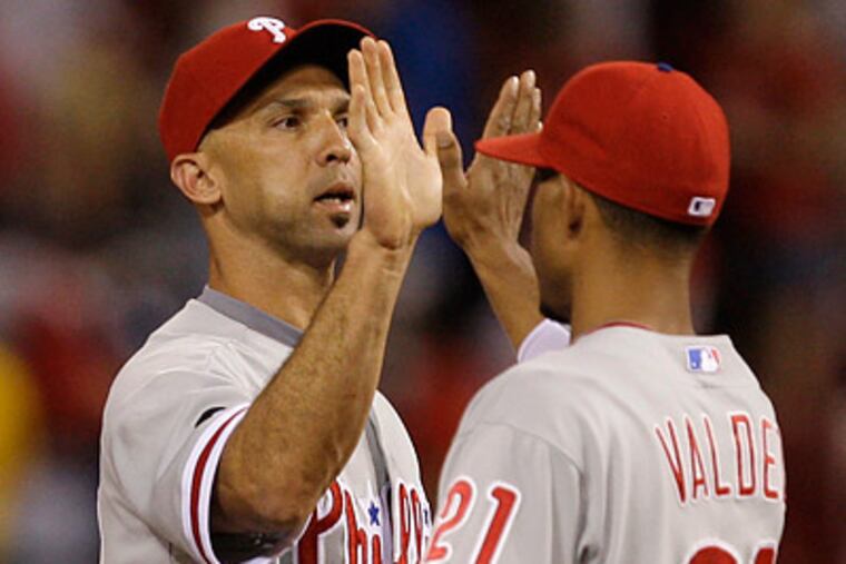 Raul Ibanez drove in two runs with a double in the 10th inning of the Phillies' win. (Al Behrman/AP)