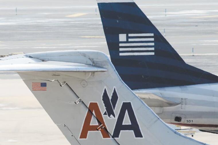 FILE - Six states, including Pennsylvania, and the Justice Department sue to block the merger of U.S. Airways and American Airlines. (AP Photo/Matt Rourke, File)