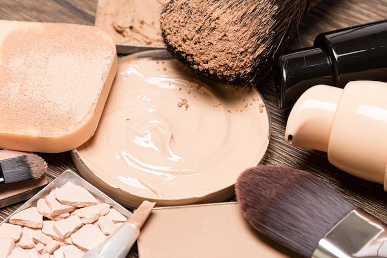Basic makeup products for flawless complexion: foundation, concealer, powder, cosmetic sponge, brushes.