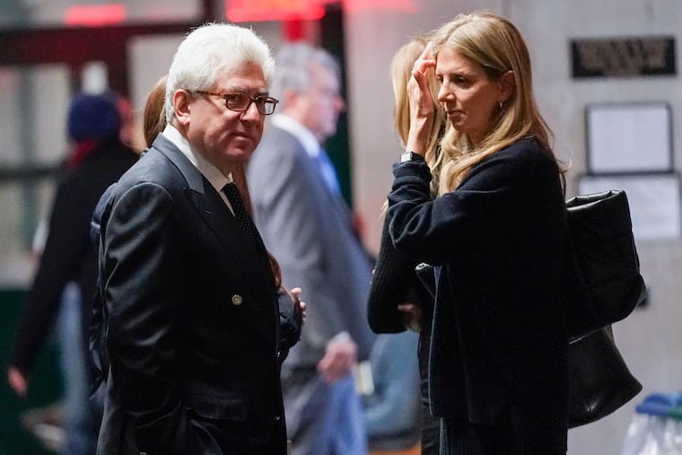 Rare-book dealer Glenn Horowitz, left, is seen in the supreme court hall way during a break in proceedings, on Wednesday in New York.