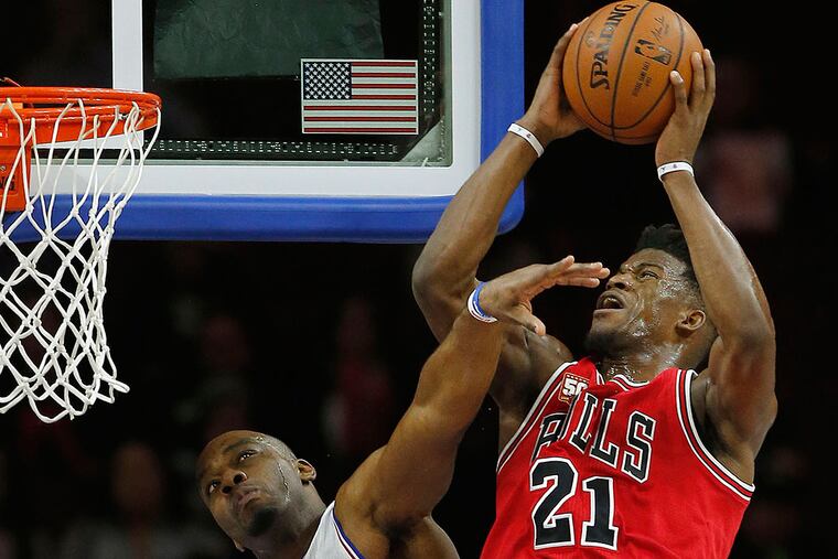 Carl Landry fouls the Bulls' Jimmy Butler.