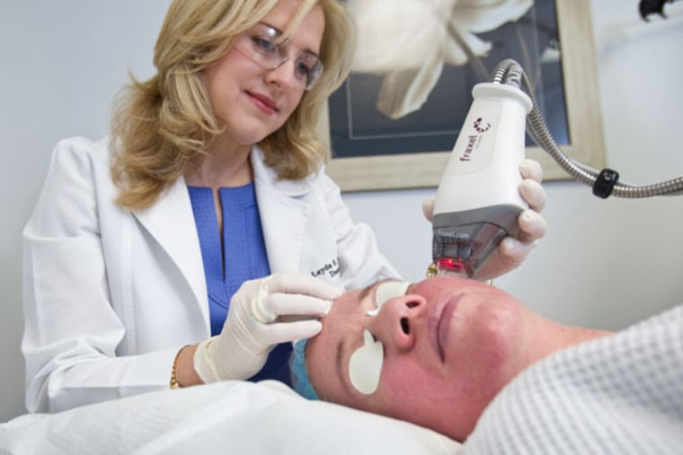 Dr. Leyda E. Bowens performs a Fraxel Laser treatment for wrinkles and acne scars on Maria Elena Ferrer on the Mercy Hospital campus in Miami, Florida, on April 17, 2013. (C.W. Griffin/Miami Herald/MCT)