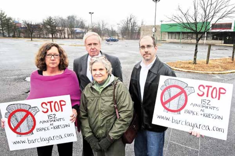 From left to right, at the proposed site for the apartments at Brace and Kresson Roads in Cherry Hill, are: Martha Wright, Bert MacKay, Susan McNaughton, and Eric O'Dell. ( APRIL SAUL / Staff )