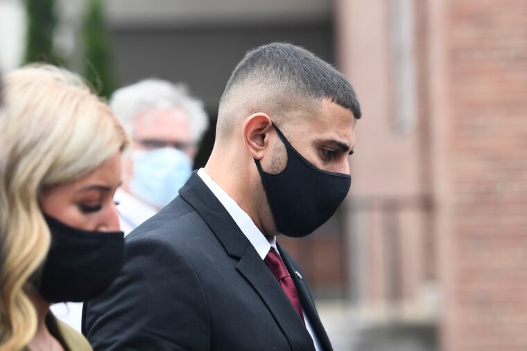Nauman Hussain (center), shown leaving court Sept. 2, 2021, in Schoharie, N.Y.