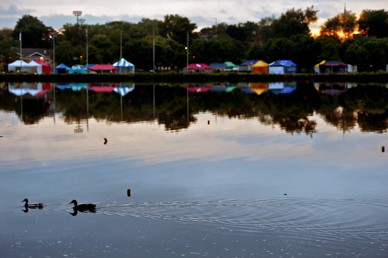 A pair of ducks have the Cooper River to themselves at sunset Thursday, May 17, 2018.