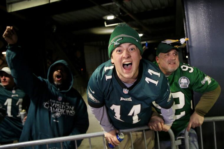 Eagles fans celebrate a touchdown during the second half of the NFC Championship game at Lincoln Financial Field on Sunday, Jan. 21, 2018. The Eagles won 38-7. TIM TAI / Staff Photographer