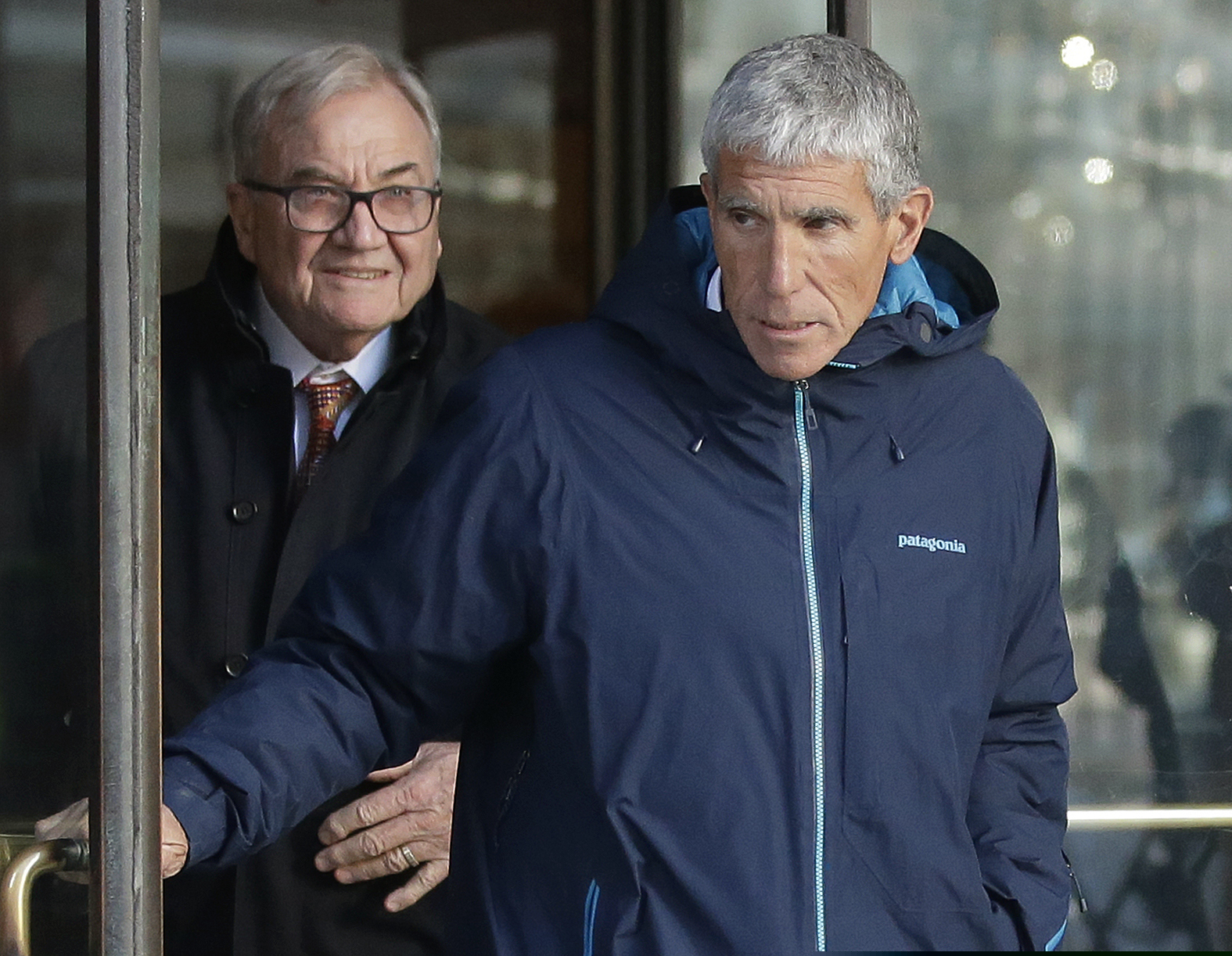 William "Rick" Singer, founder of the Edge College & Career Network, exits federal court in Boston on March 12, 2019, after he pleaded guilty to charges in a nationwide college admissions bribery scandal.
