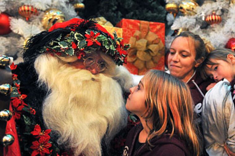 Santa listens to Christmas wishes in the Fiesta Plaza at the Tropicana Casino & Resort in Atlantic City. (SHARON GEKOSKI-KIMMEL / Staff Photographer)