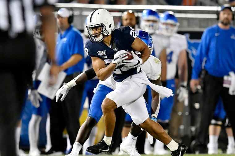 Penn State cornerback John Reid intercepts the ball from Buffalo and runs it back for a touchdown in the third quarter on Saturday, Sept. 7, 2019. (Abby Drey/Centre Daily Times/TNS)