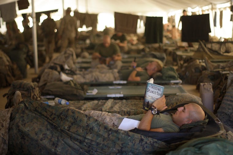 U.S. Marines from the 2nd Marine Expeditionary Brigade rested inside a tent at Camp Leatherneck in Afghanistan's Helmand province on June 9, 2009.