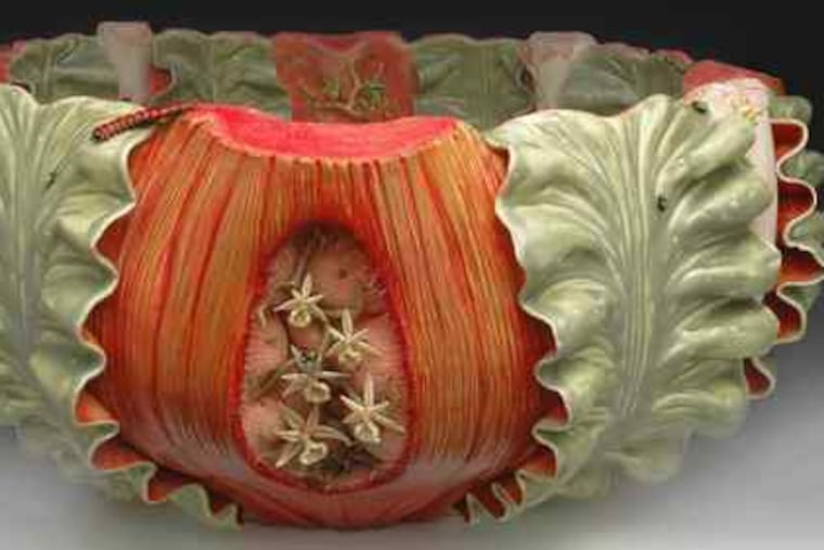 Bonnie Seeman's large bowl is made of porcelain and glass and is in a show affiliated with the National Council on Education for the Ceramic Arts conference held here last week.