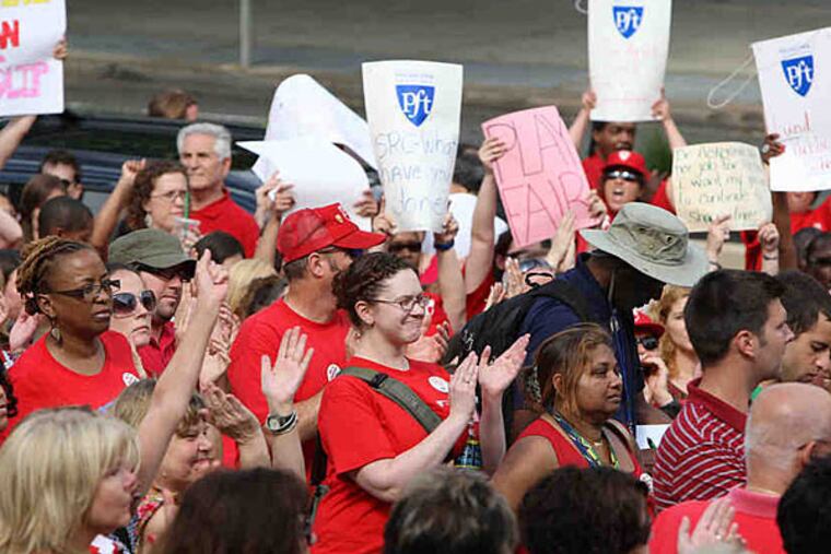 File photo: In 2011, city teachers try to attend a School Reform Commission meeting after a rally at district headquarters. (Steven M. Falk/Staff)