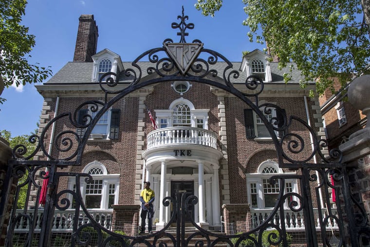 A Drexel University Public Safety officer stands guard May 9, 2017 outside the fraternity Tau Kappa Epsilon (TKE) on Powelton Ave. which has been suspended by the university while under investigation for a pair of sexual assaults.